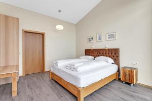 Postel nebo postele na pokoji v ubytování 4bed 4bath Sauna & Hot tub