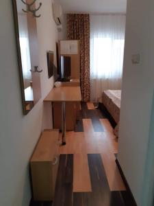 TV a/nebo společenská místnost v ubytování Hotel Mya