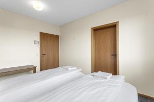Postel nebo postele na pokoji v ubytování 4bed 4bath Sauna & Hot tub