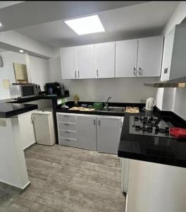 Cucina o angolo cottura di Inviting 1-Bed Apartment in Ksar sghir