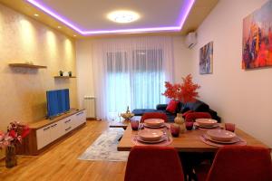 Prostor za sedenje u objektu Royal Apartman