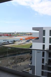 a view of an airport from a building at Luxe Central Apt: Free Parking in Oradea