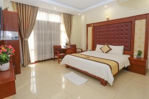 Ένα ή περισσότερα κρεβάτια σε δωμάτιο στο Hotel Sunny HG