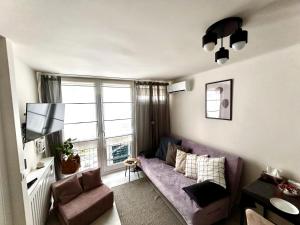 Posezení v ubytování Sky Apartment Comfy Suite Pereca