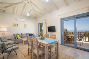 TV a/nebo společenská místnost v ubytování Cielo by Vintage Travel