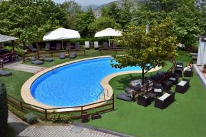 Bazén v ubytování Hotel Pelion Resort nebo v jeho okolí