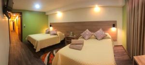 Voodi või voodid majutusasutuse Hostal Terra 4 - EL LABRADOR toas