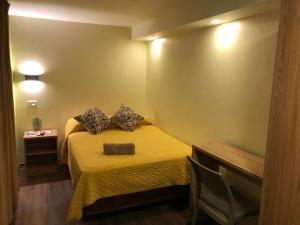 Voodi või voodid majutusasutuse Hostal Terra 4 - EL LABRADOR toas