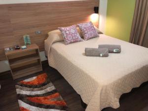 Voodi või voodid majutusasutuse Hostal Terra 4 - EL LABRADOR toas
