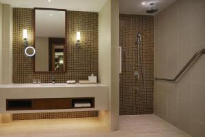 a bathroom with a sink and a shower at The Westin Desaru Coast Resort in Desaru