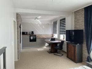 Kuchyň nebo kuchyňský kout v ubytování Apartment Hildesheim