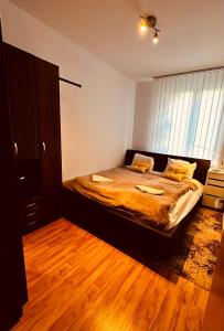 Posteľ alebo postele v izbe v ubytovaní Zoe apartman