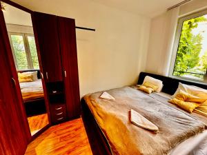 Posteľ alebo postele v izbe v ubytovaní Zoe apartman