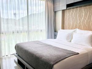 Postel nebo postele na pokoji v ubytování Kamala Beach Resort P55