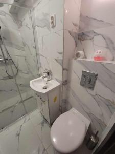 Koupelna v ubytování Apartamenty Kącik