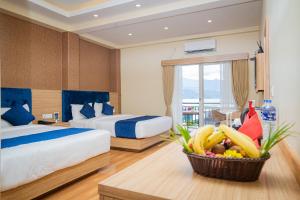 Majestic Lake Front Hotel & Suites 객실 침대