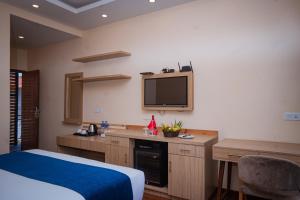 Majestic Lake Front Hotel & Suites 객실 침대