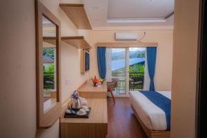 Majestic Lake Front Hotel & Suites 객실 침대