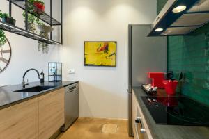 Kuchnia lub aneks kuchenny w obiekcie Loft Center Burgos by Unique Rooms