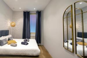 Łóżko lub łóżka w pokoju w obiekcie Loft Center Burgos by Unique Rooms