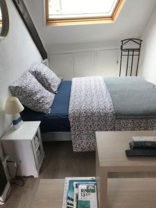 Ένα ή περισσότερα κρεβάτια σε δωμάτιο στο PLEIN CENTRE TRES GRAND STUDIO