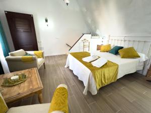 Postel nebo postele na pokoji v ubytování Casita zamudio