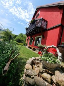Vonkajšia záhrada v ubytovaní Apartamenty u Bodzia
