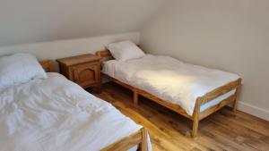 Voodi või voodid majutusasutuse Boshovense Velden toas