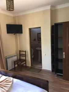 TV o dispositivi per l'intrattenimento presso Hotel TWINS ANNA