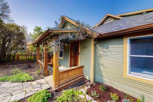 a small house with a porch and a porch at Bozeman Bungalow at Beall in Bozeman