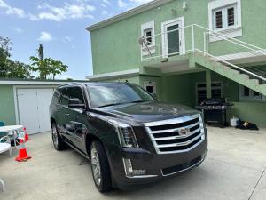 a black truck parked in front of a house at Wintberg Tropical Villas in Mandal