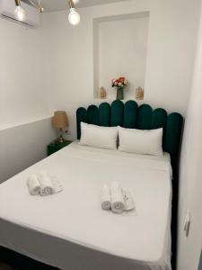 Postel nebo postele na pokoji v ubytování Boutique Hotel Honey