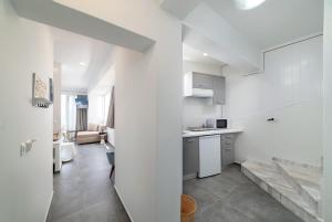 Η κουζίνα ή μικρή κουζίνα στο Serenita luxury apartment 4