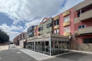a building on the side of a street at La Garita Vista azul in La Garita