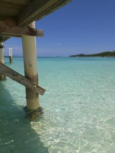 a pier in the water near the ocean at Paradise, just a click away, style, comfort, home. in Hermitage