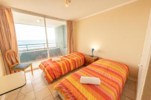 Ένα ή περισσότερα κρεβάτια σε δωμάτιο στο Oceana Suites Eurovista