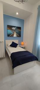 Кровать или кровати в номере Manzoni 159