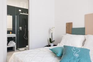 Letto o letti in una camera di Nimar Suite