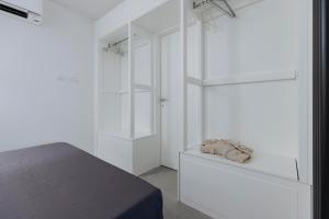 Letto o letti in una camera di Pantheon Experience Suite