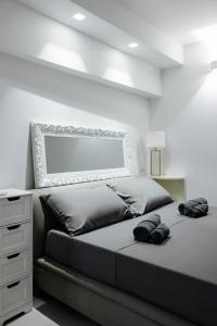 Letto o letti in una camera di Pantheon Experience Suite