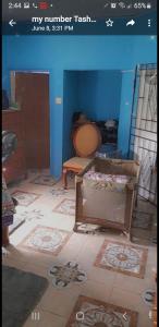 a picture of a room with tile floors in a room at Fee easy studio in Black River