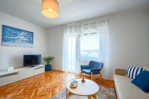 TV a/nebo společenská místnost v ubytování Apartman Ivan