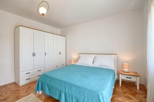 Postel nebo postele na pokoji v ubytování Apartman Ivan