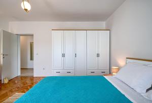 Postel nebo postele na pokoji v ubytování Apartman Ivan