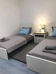 Postel nebo postele na pokoji v ubytování Sunset Rental