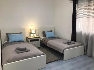 Posteľ alebo postele v izbe v ubytovaní Sunset Rental
