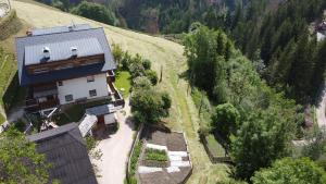 an aerial view of a house on a hill at Lüch da Morgnun in San Vigilio Di Marebbe
