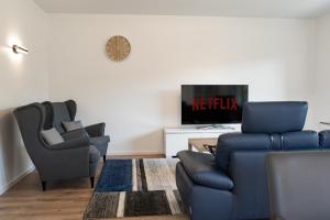 Posezení v ubytování bonquartier Stilvoll aufm Land leben, Top-Anbind