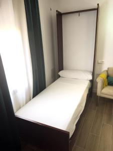 Postel nebo postele na pokoji v ubytování Casita zamudio