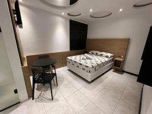 Ένα ή περισσότερα κρεβάτια σε δωμάτιο στο Sense Motel